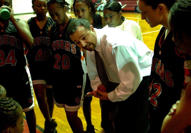 Brent Barker, seen here in 2006 with former assistant coach Nattlie McArthur, spent nearly 30 years as head coach of the South View girls' basketball team.